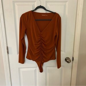 Abercrombie&Fitch. Terracotta Long Sleeve Bodysuit. Size L.